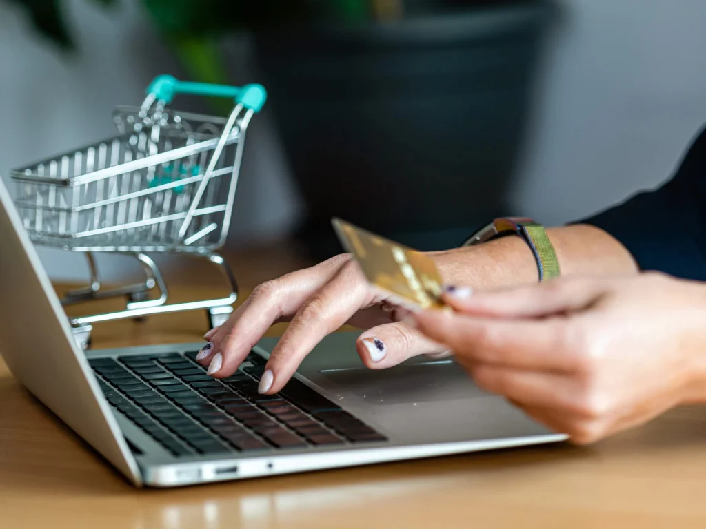Shopper paying by card on a laptop, illustrating online shopping growth in Southeast Asia