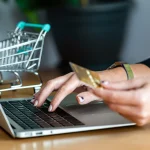Shopper paying by card on a laptop, illustrating online shopping growth in Southeast Asia